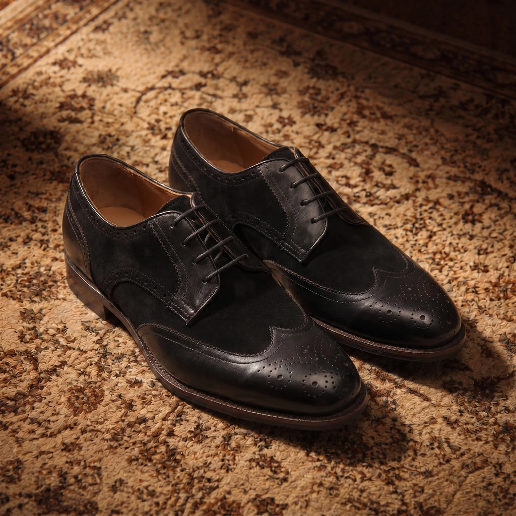 Handmade derby brogue shoe in full grain leather and suede placed on a luxurious Persian rug